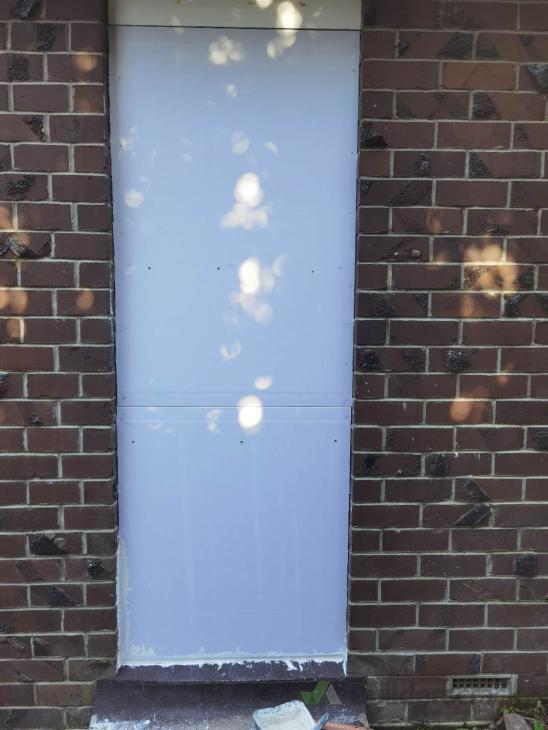 Converting a door to wall need blocking exterior wall with bricks