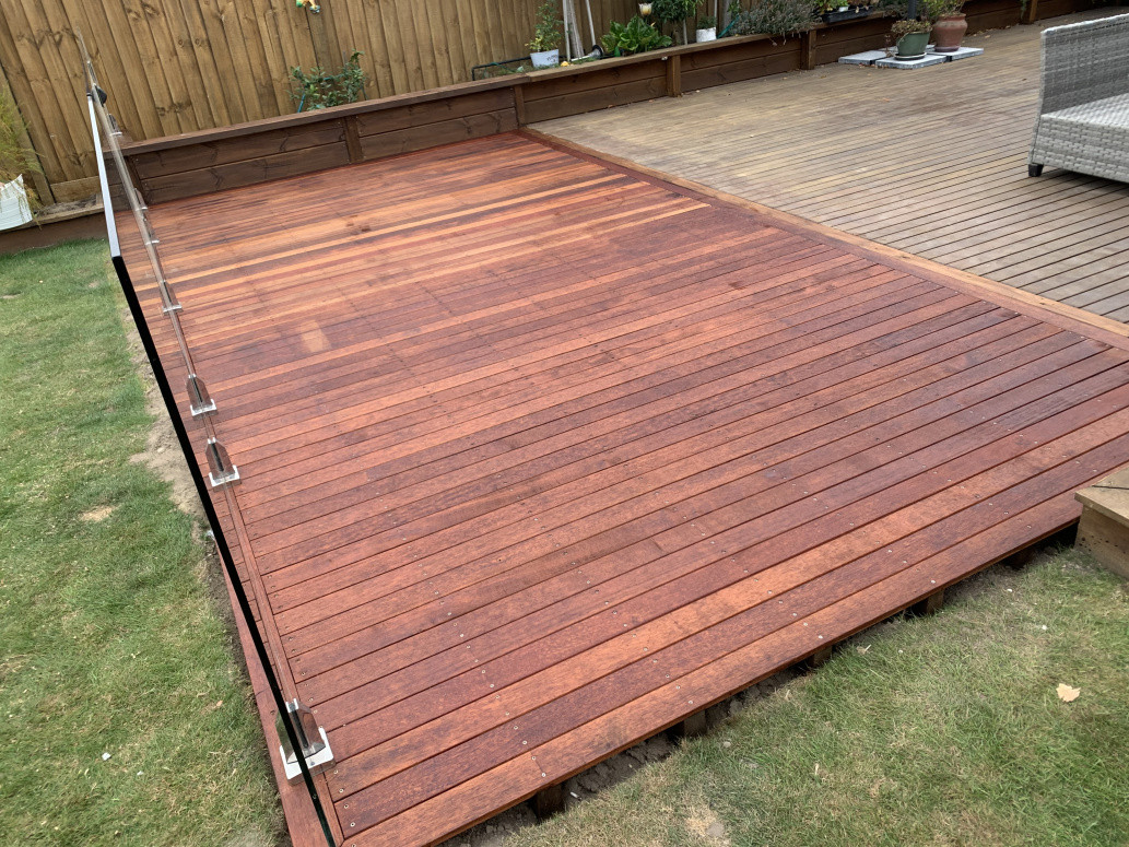 Kwila decking and frameless glass fencing