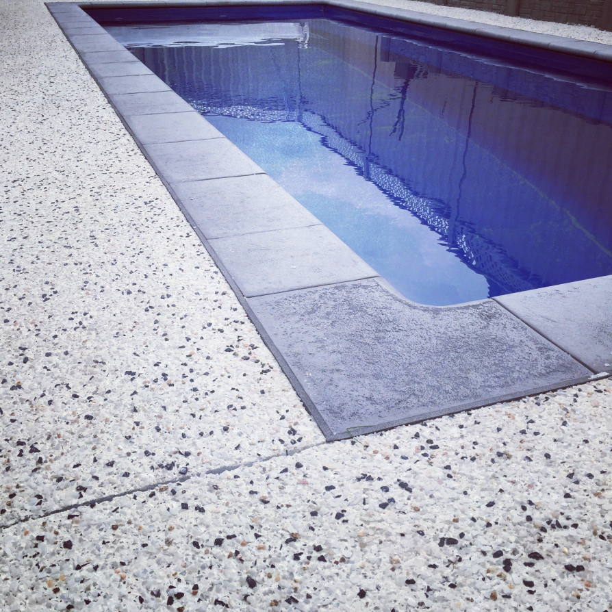Swimming pool coping and exposed aggregate with crème base