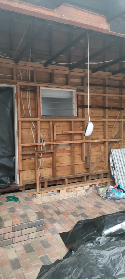 Clean and removed class b and a asbestos from ceiling and cladding walls..