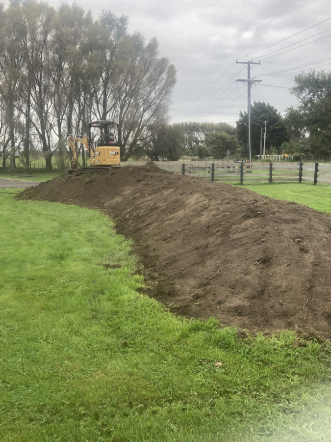 Garden mound shaped prior to wood shavings applied