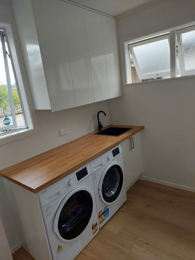Full Laundry Renovation Inc painting,  flooring, wall & tall pantries.