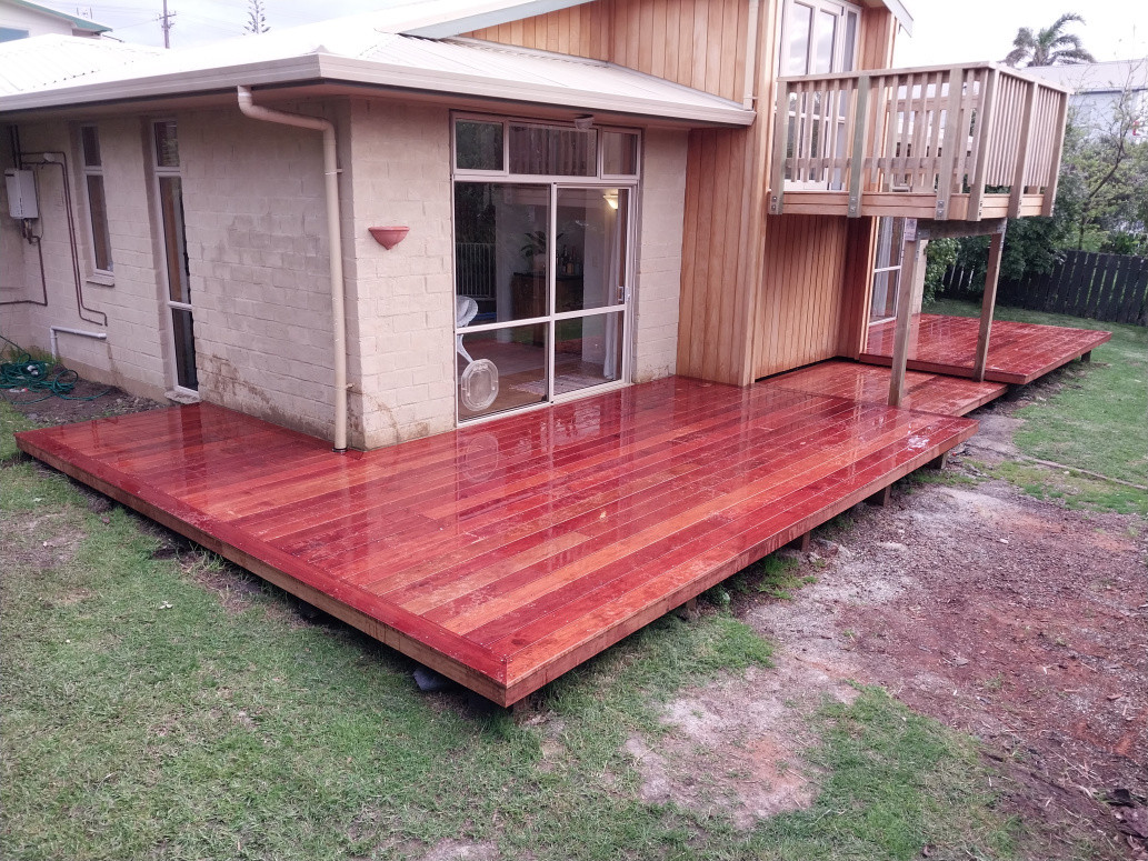 Kwila decks and macracarpa shiplap Cladding