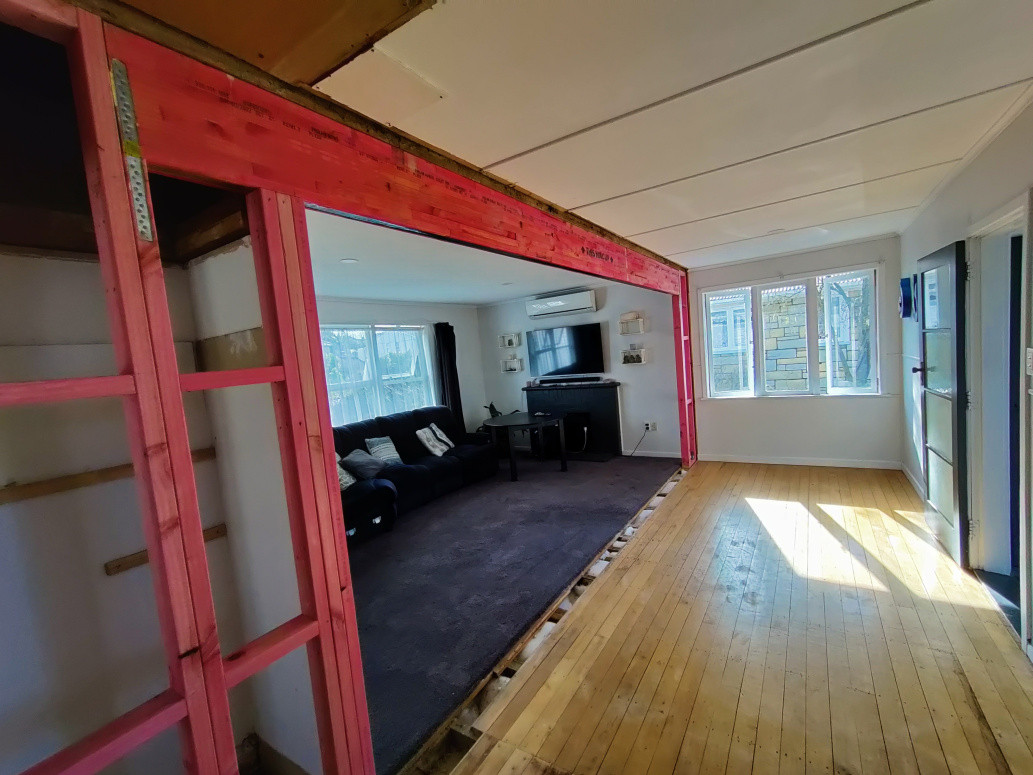 Removal of load bearing wall for lounge to dining room open plan.