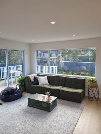 Lounge- floor repacement with timber laminate flooring.