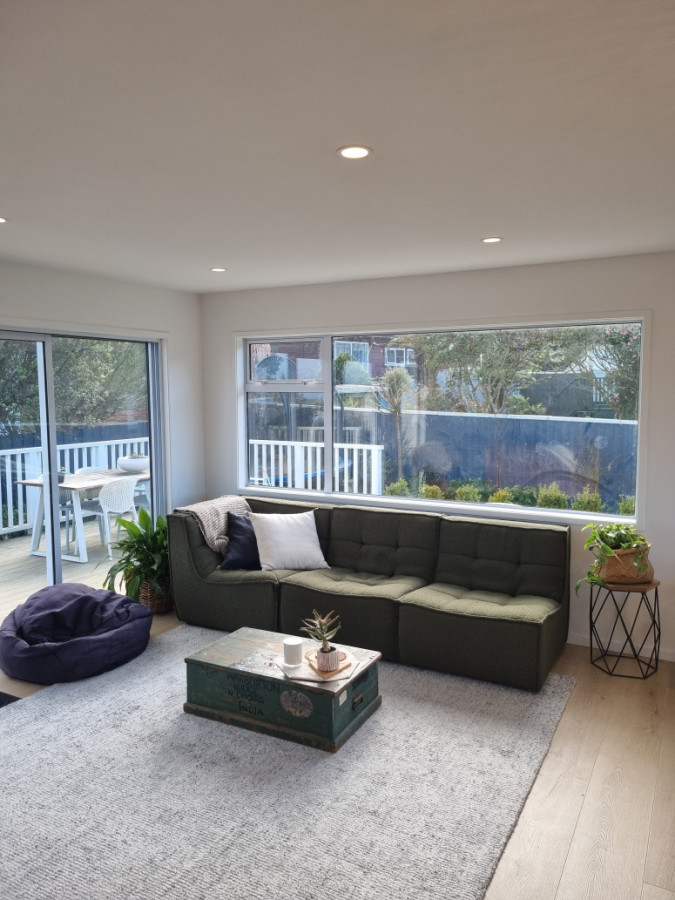 Lounge- floor repacement with timber laminate flooring.