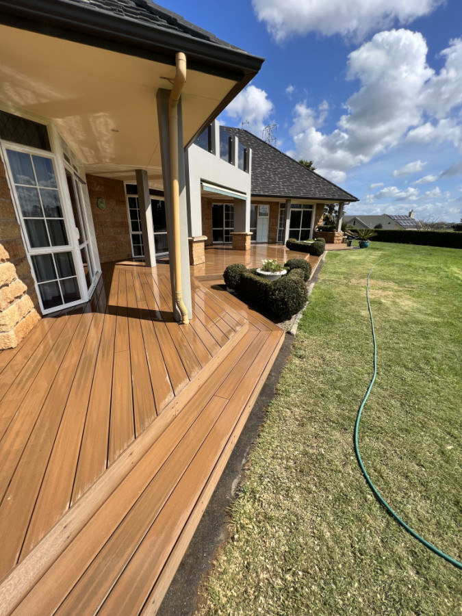 Removed old pine decking, upgraded foundations and installed new composite decking.