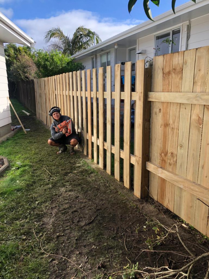 Another 1 of our hard workers (Monty) he is very proud of his hard work on this new fence