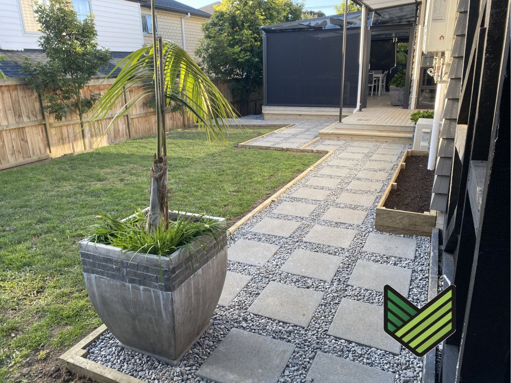 Permeable paved / river pebble pathway.