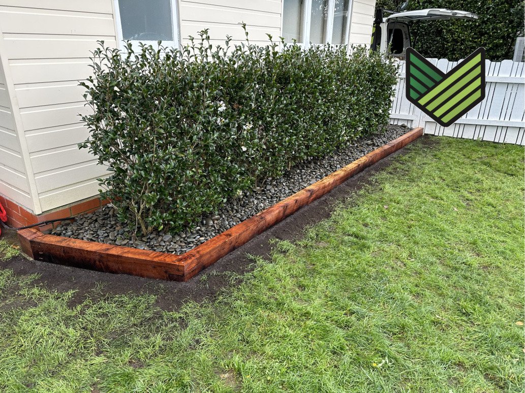 Redwood sleeper garden edging.