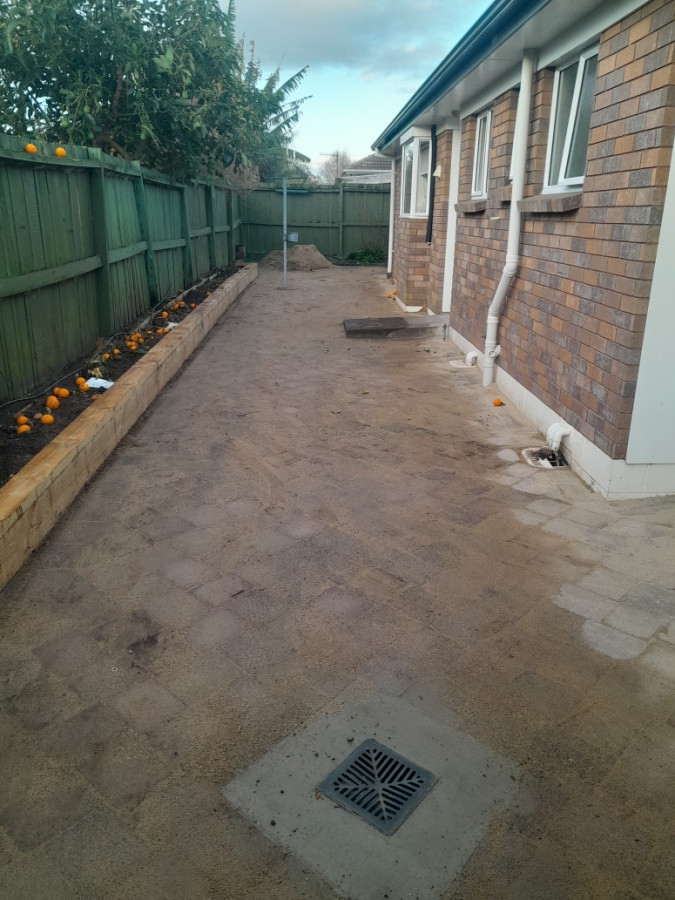 Re laying pavers and tetaining wall after