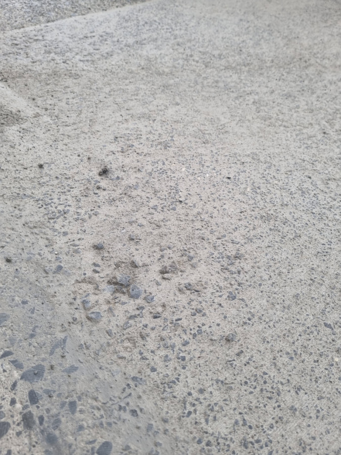 Rain damage concrete from unknown contractor