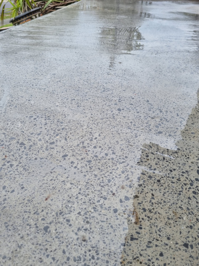 Concrete grind to fix rain damage