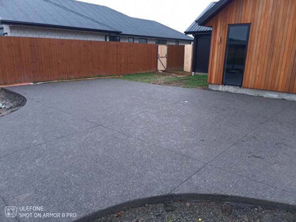 Driveway I installed exposed aggregate with black oxide acid washed and sealed.