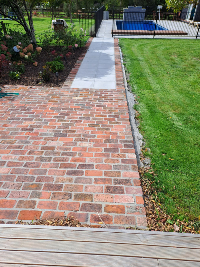 Brick patio and paved pathway