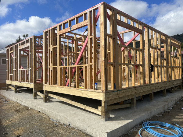Frames braced ready for trusses.