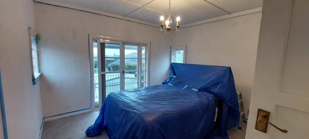 Seal and skimcoat, 1 coat after wallpaper removal by the homowner