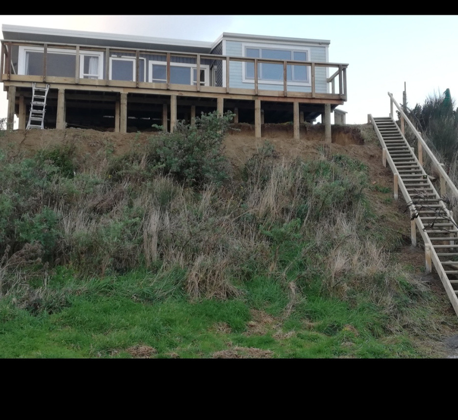 Massive compostie deck and staircase overhanging 20m cliff