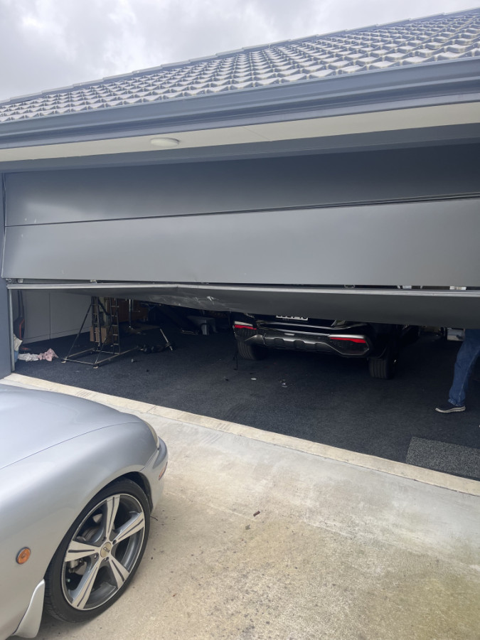 Urgent Garage Door repairs - sectional panel, tilt or roller garage doors. Manawatu-Kapiti