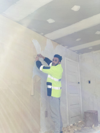 Stripping wallpaper then skimming walls