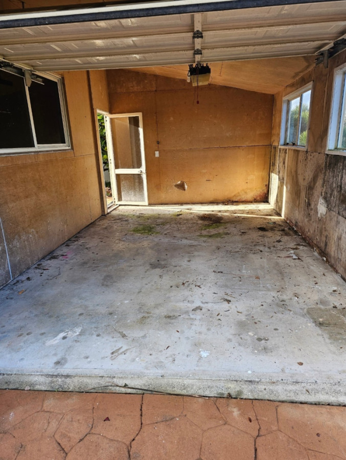 BEFORE - Flood damaged and rising damp