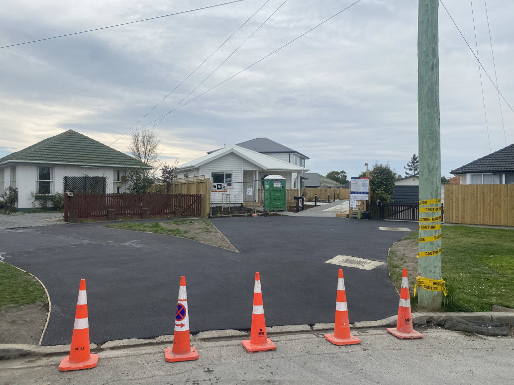 A vehicle crossing for a new lot of flats and a existing house we have the pleasure of sealing