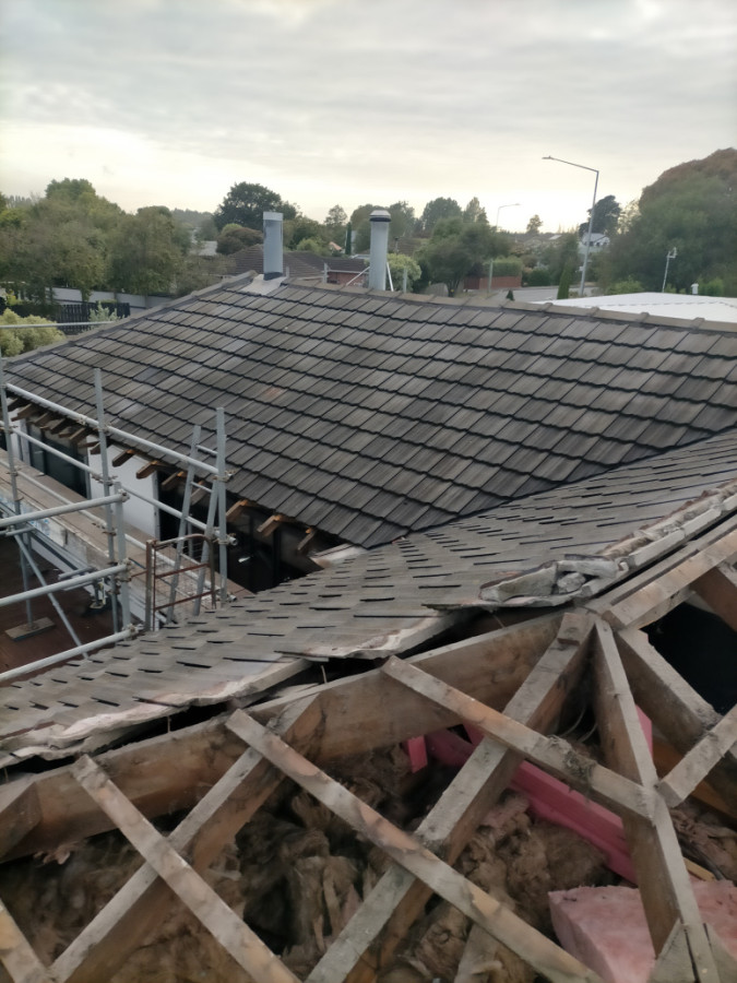 Re-roof with new purlins and long run iron