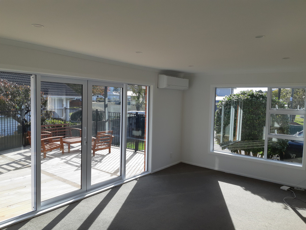 Lounge renovation, fully gibbed, new aluminium joinery (sliding doors and window), new deck