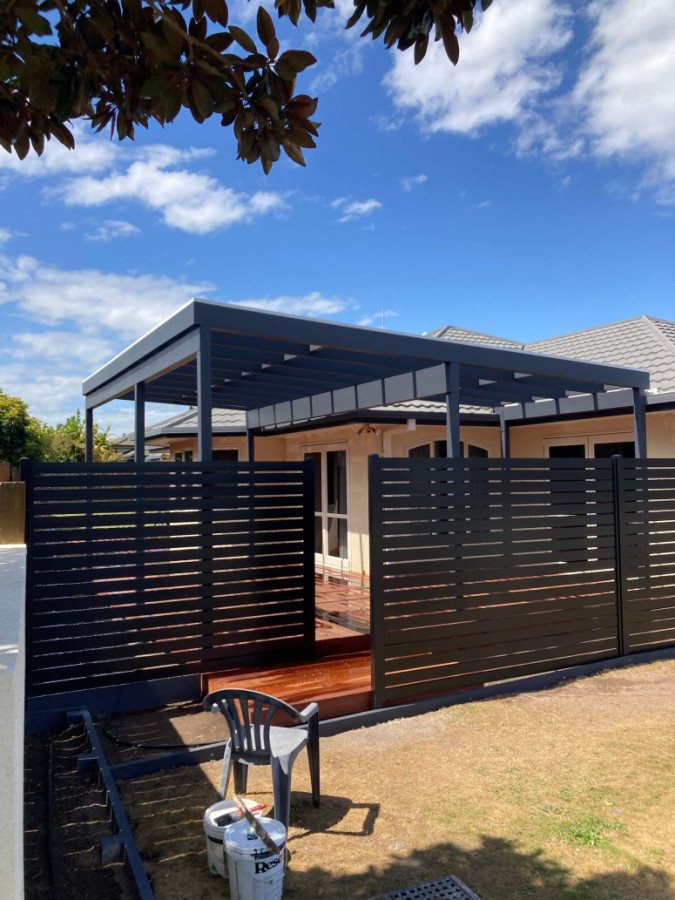 Roofed pergola , kwilla deck and slat privacy screens