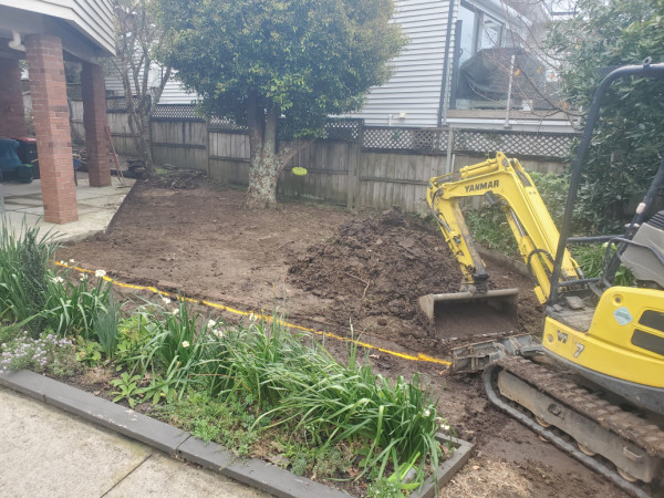 Strip grass and excavate and remove 200mm topsoil.