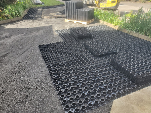 Installing paving mats.