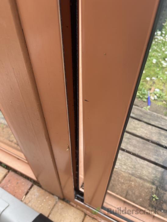 Sliding door not closing properly ( 906789) Builderscrack