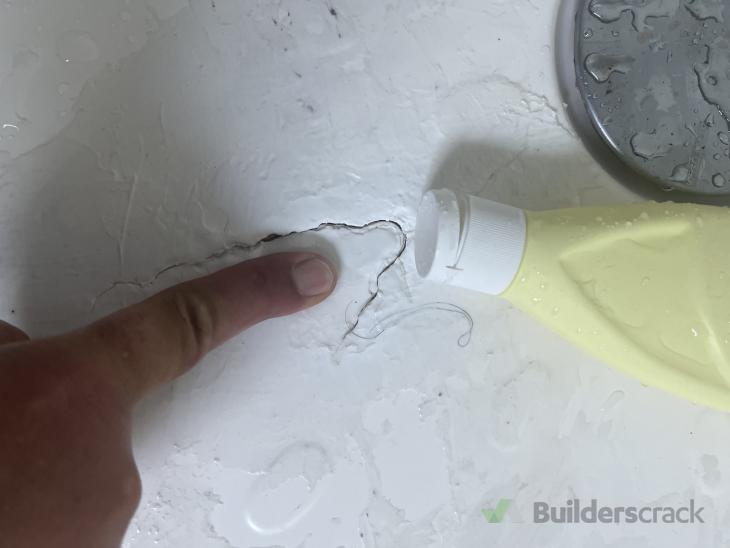 Crack shower floor ( 916765) Builderscrack