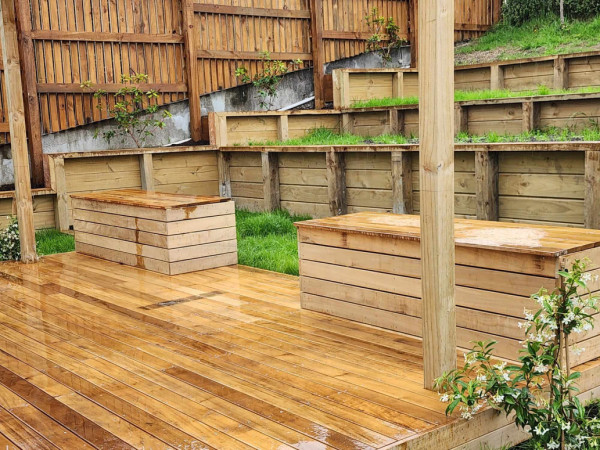 Vitex deck with seating with hidden storage.