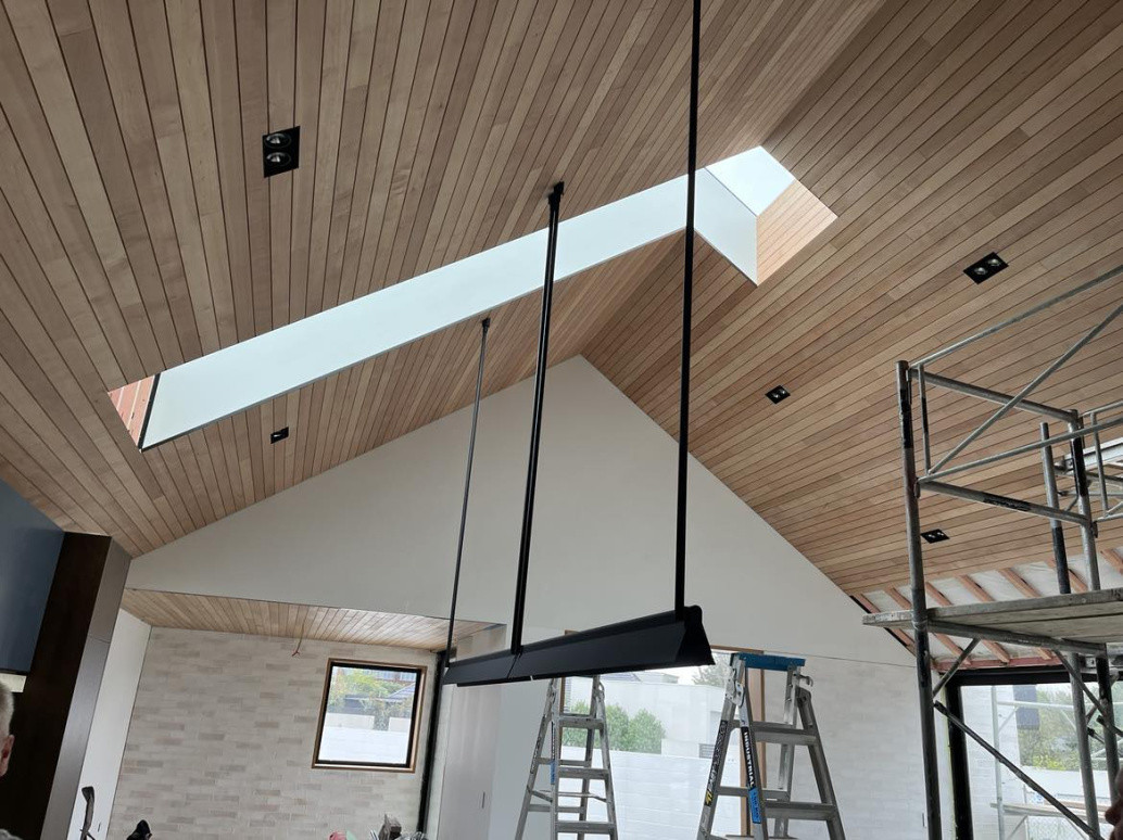 Lovely black double downlights  and amazing pendant on pine ceiling