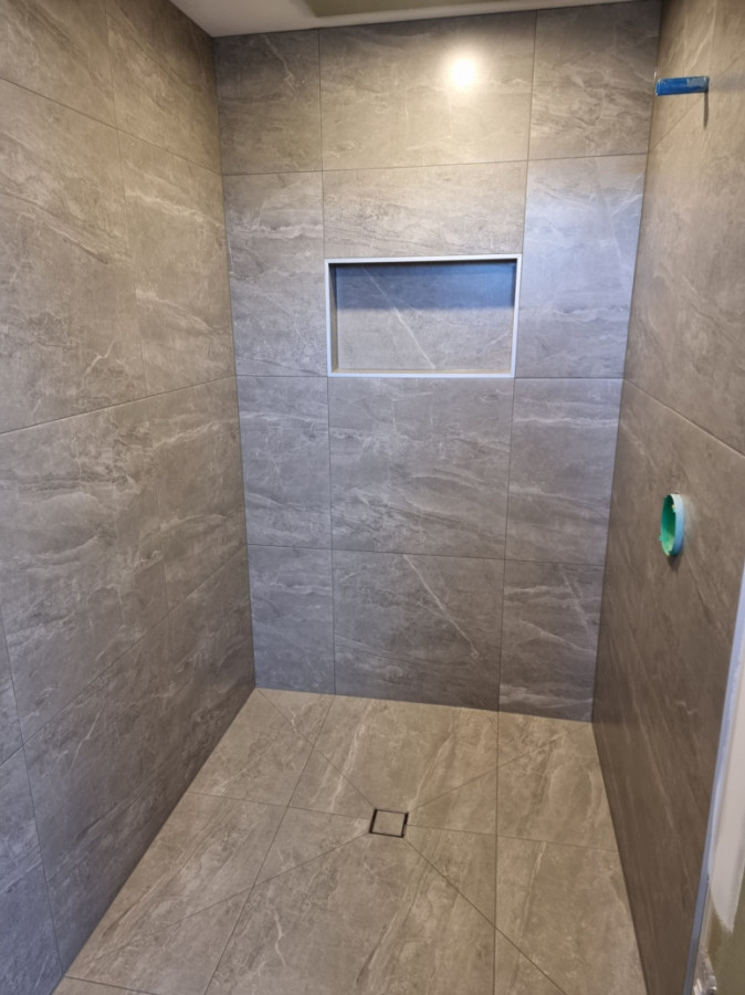 Ensuite tiling with square drain