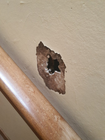 Hole at wall