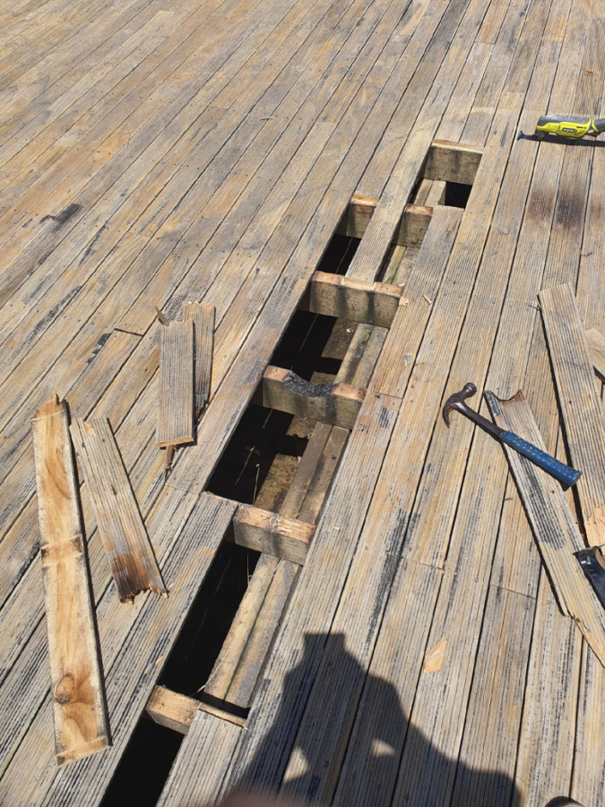 damaged and bent deck palling.