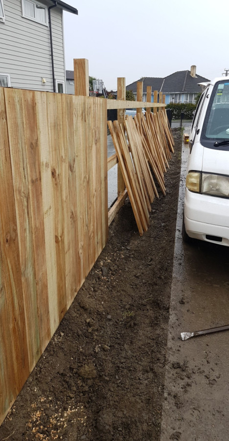 Post, rail and pailing fencing with a truss finish