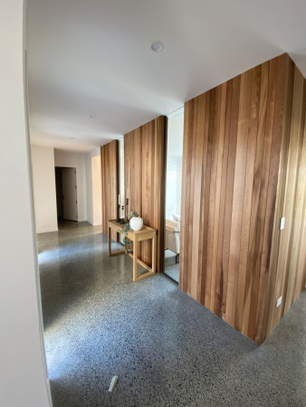 Cedar sarking on walls/Grind and polish concrete floor