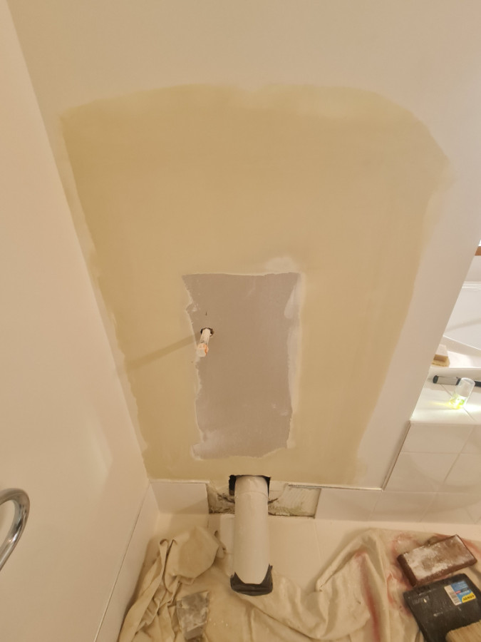 Gib patch with plaster after toilet leaked