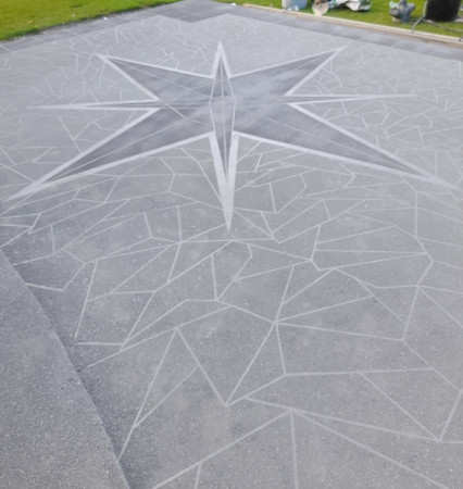 Custom spray-on concrete any color design this was over damaged concrete