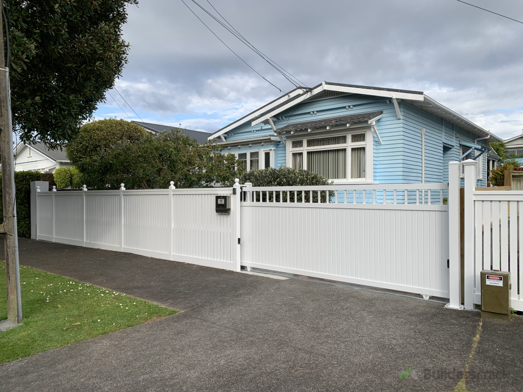 slat fence and window top gate in westmere