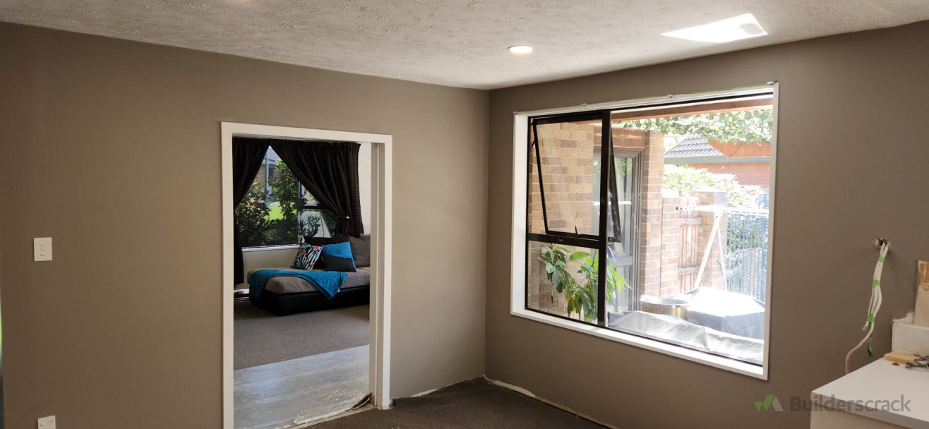 Plastering and painting of new walls.