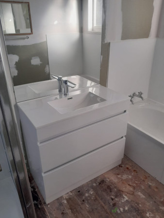 New vanity with mirror above