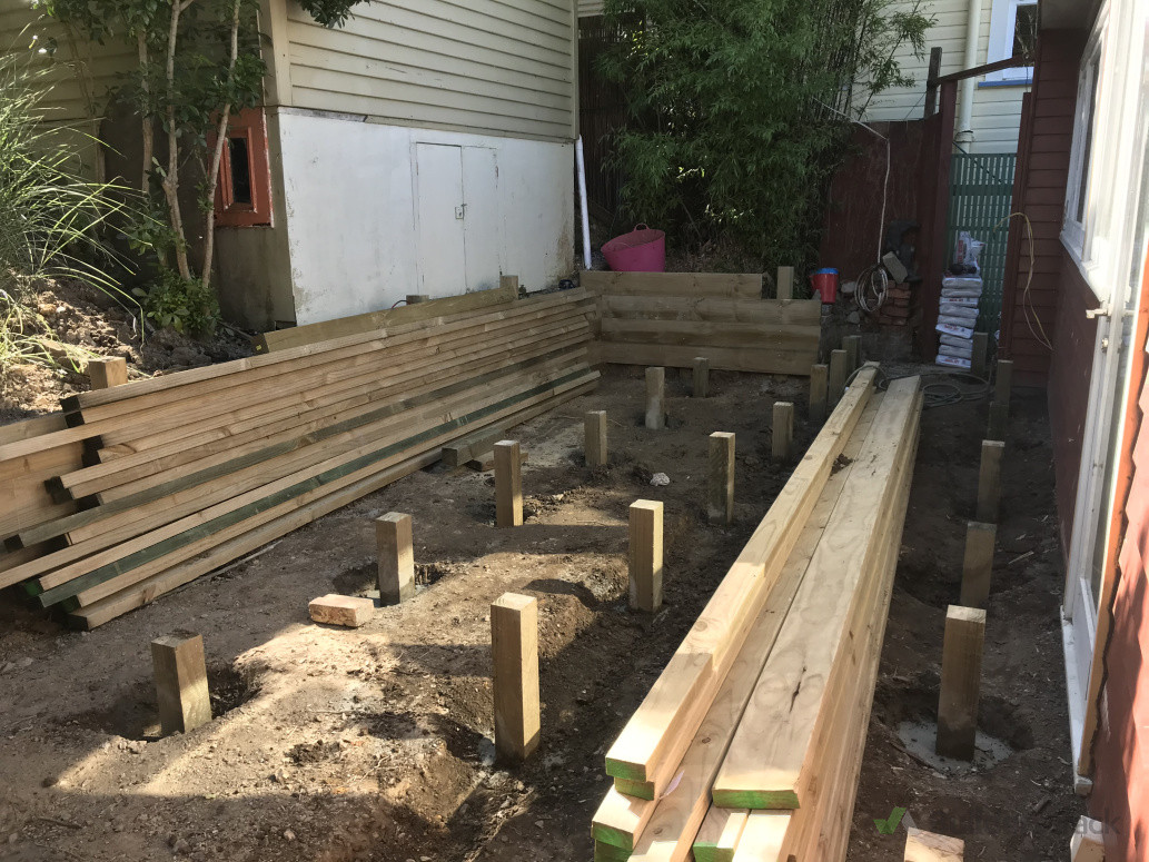 Retaking boards on, deck piles in.