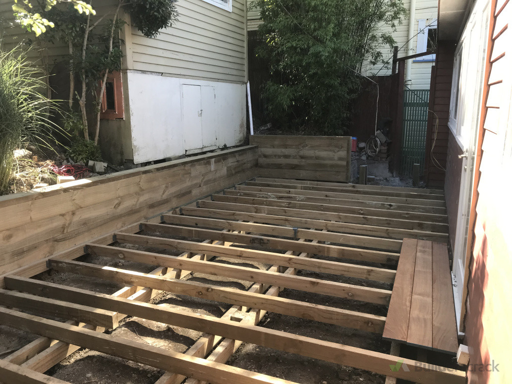 Retaining wall capped, Bearers and joists in.