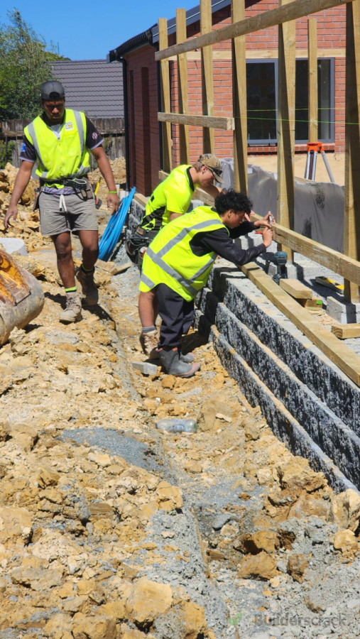 young ladz chucking rails up . fence was boxed in to key stone wall.