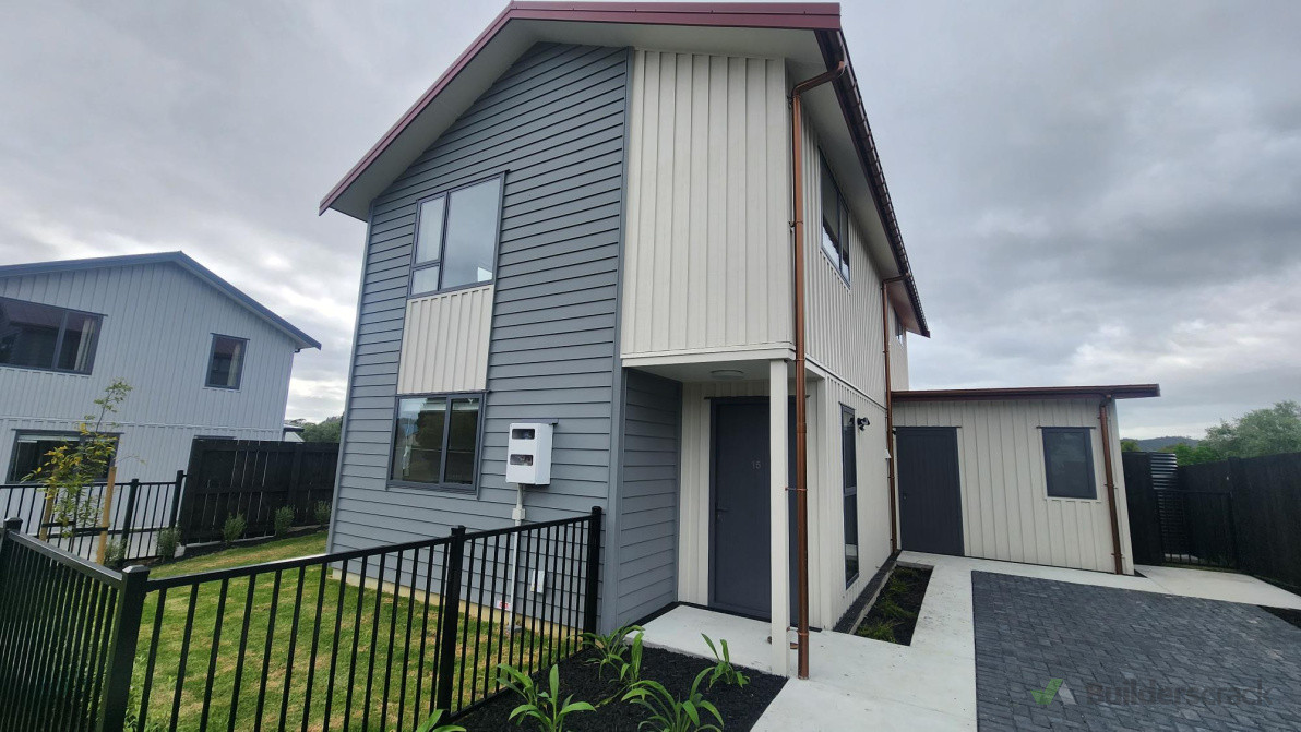 exterior board and battern / linea cladding  and permeable driver way.