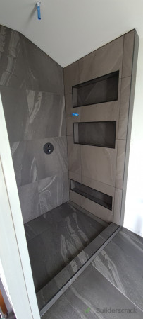 Built in shower with reassessed shelves